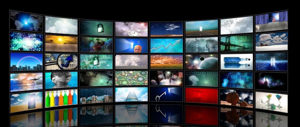 Picture Showing Multiple TV Screens on a wall